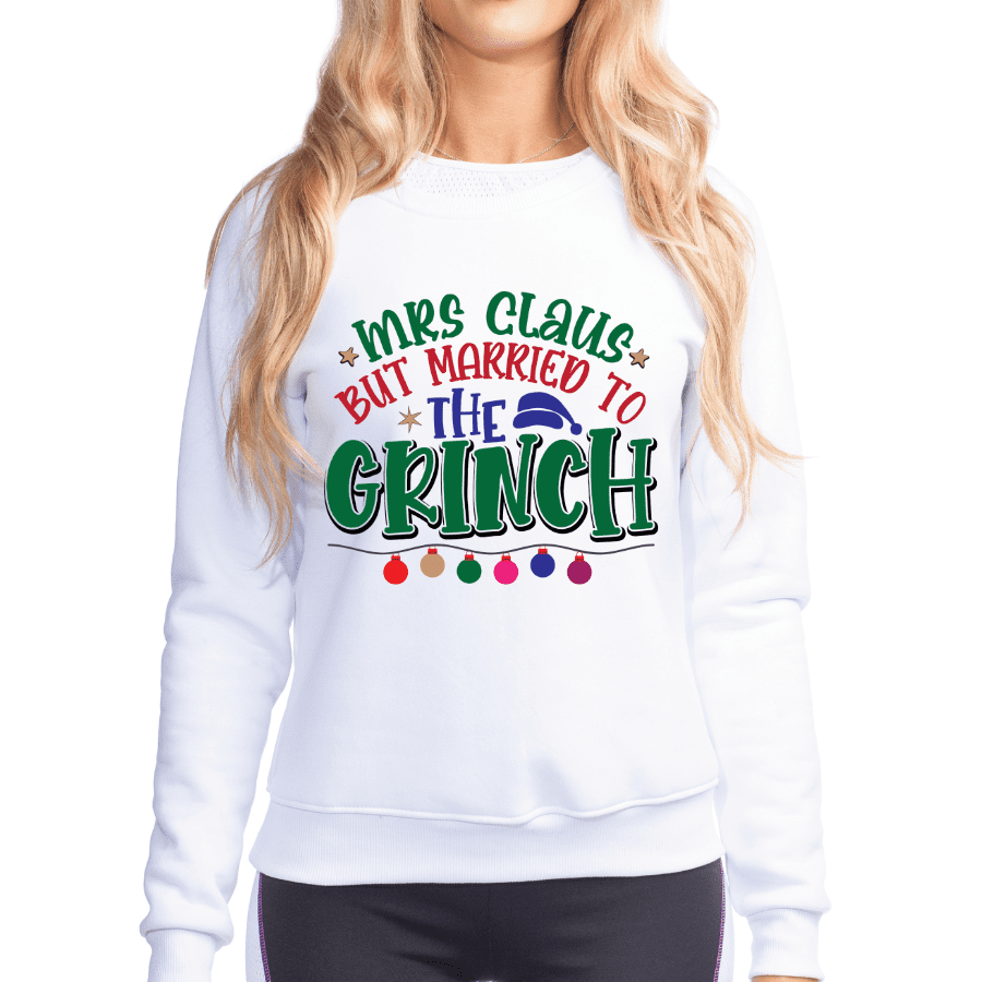 Image shows a t shirt transfer that says Mrs Claus but married to the Grinch
